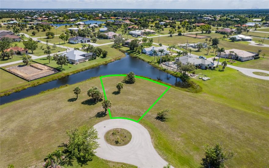 LIVE THE FLORIDA DREAM WITH THIS BEAUTIFUL LAKE FRONT LOT IN BURNT STORE LAKES. Lovely, close knit community with tons of amenities available, without the high HOA fees (only $464 annually). Public utilities are also available. Residents enjoy kayaking, canoeing, bird watching and fishing in the eleven lakes found throughout the community. The Community Park includes “old Florida style” pavilions sheltering many picnic tables, restrooms, a playground, and a full residents event calendar at the community center. There is also a community kayak/canoe launch accessing Charlotte Harbor, where world class fishing and nature watching is enjoyed! Imagine seeing manatees and porpoises within a 15-minute paddle! Adjacent to Burnt Store Marina, where you can enjoy amenities such as golfing, boating with full-service marina, Freedom Boat Club, fitness center, activity center and several onsite restaurants. Perfectly located near downtown Punta Gorda , Punta Gorda airport, and minutes to the NW Cape Coral. Check out the community web site at: www.bslpoa.org. Survey available. Need a builder? We can help with that too. Possible SELLER FINANCING available.