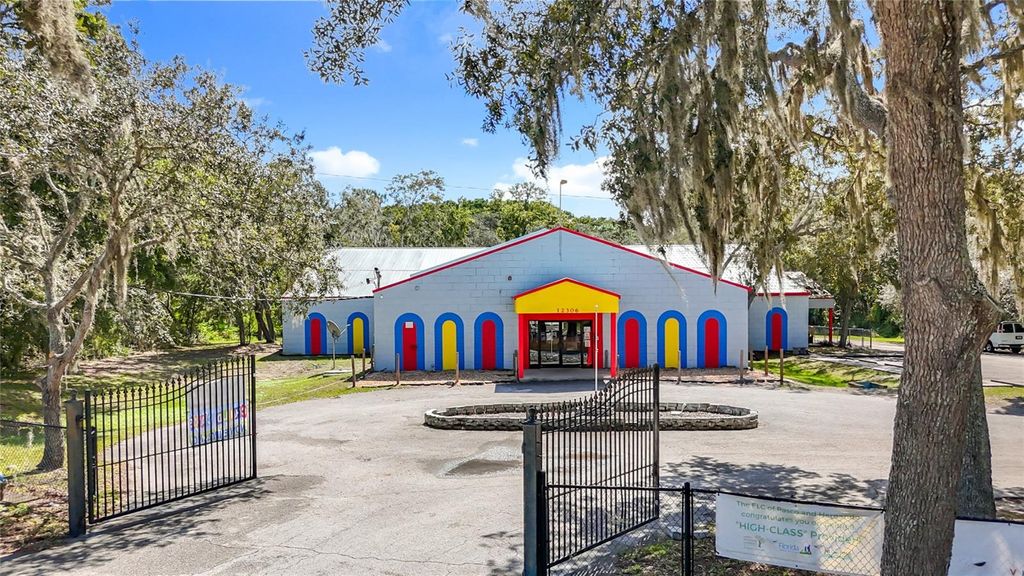 Photo of 12306 State Road 52, Hudson, FL 34669 (MLS # TB8436069)