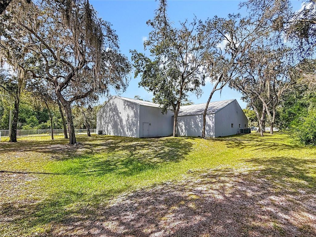 Photo of 12306 State Road 52, Hudson, FL 34669 (MLS # TB8436069)