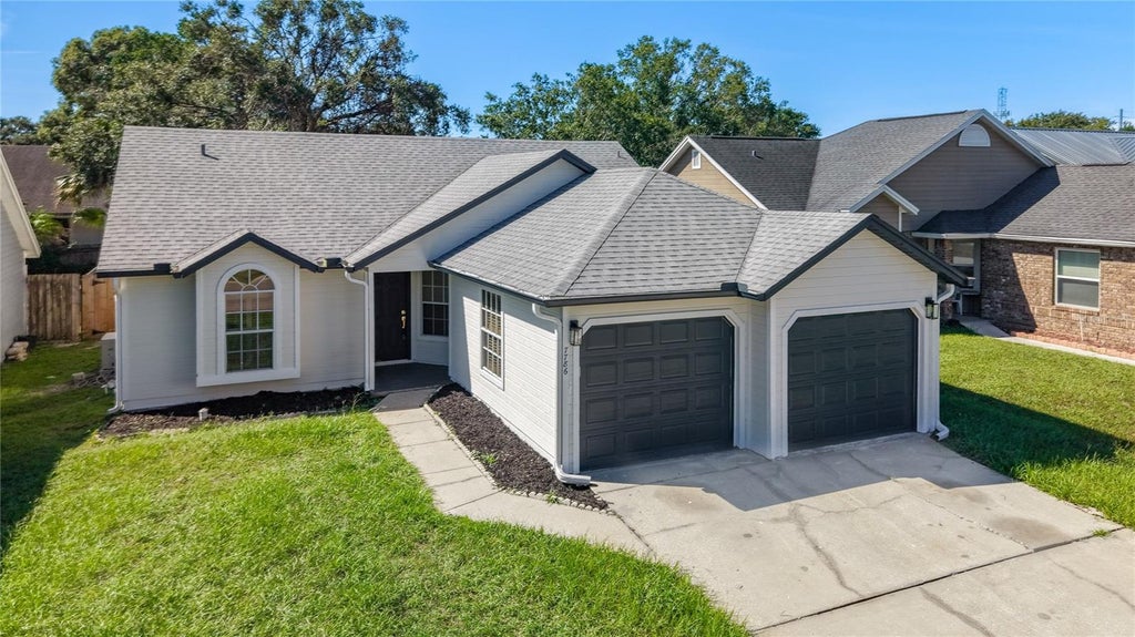 Photo of 7786 Fox Knoll Place, Winter Park, FL 32792 (MLS # O6445061)