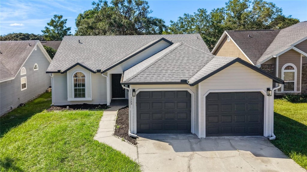 Photo of 7786 Fox Knoll Place, Winter Park, FL 32792 (MLS # O6445061)