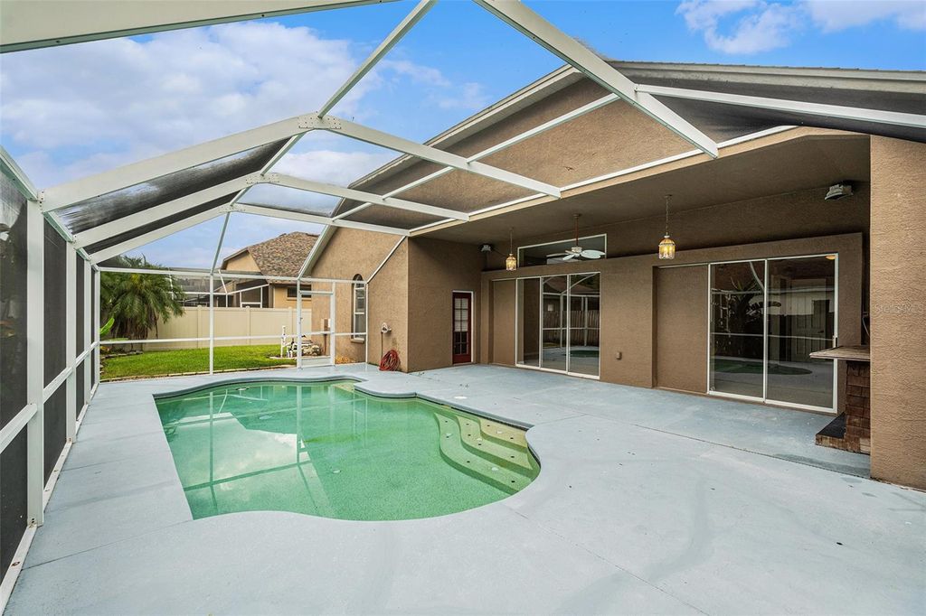 Photo of 10019 Oxford Chapel Drive, Tampa, FL 33647 (MLS # TB8408498)