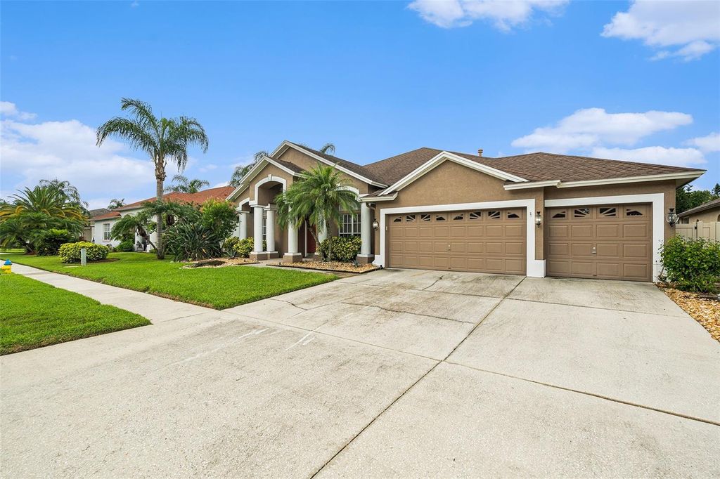 Photo of 10019 Oxford Chapel Drive, Tampa, FL 33647 (MLS # TB8408498)