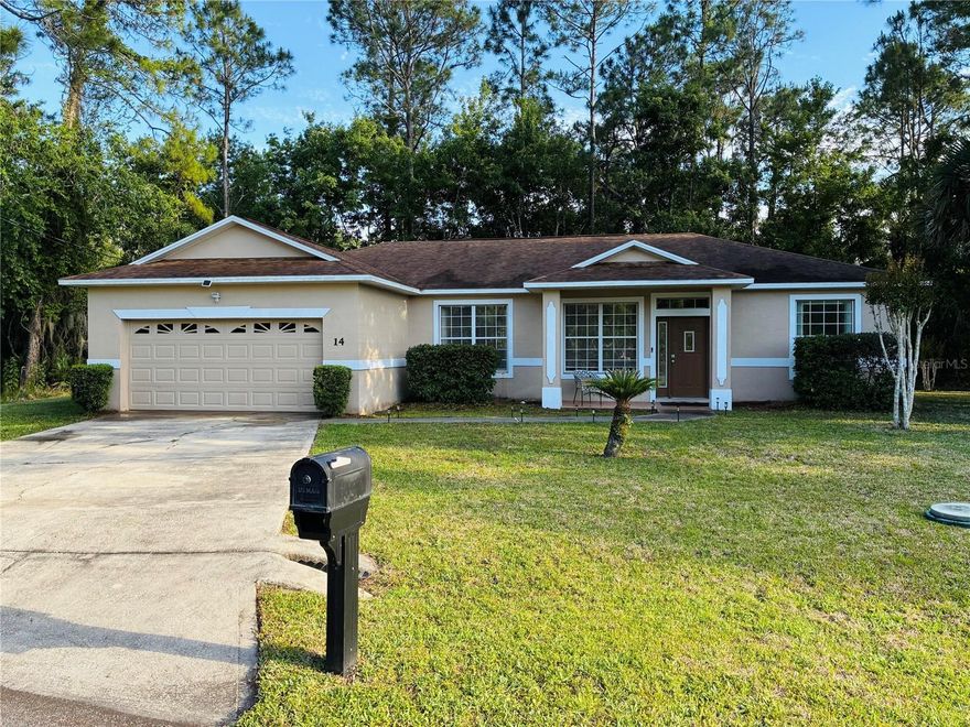 Welcome to 14 Squash Blossom Court, a beautifully maintained 3-bedroom, 2-bath concrete block home tucked away on a quiet cul-de-sac at the southernmost point of Palm Coast. With no direct neighbors and vacant lots nearby, this property features privacy and peaceful surroundings while still being conveniently located close to everything you need.

Built in 2004, this home features an open-concept living, dining, and kitchen area with tile flooring throughout the common spaces and luxury vinyl plank flooring in the bedrooms. The spacious layout flows seamlessly into a large lanai overlooking a private backyard.

Major updates include a roof approximately 8 years old, brand-new HVAC system and water heater installed in 2025, and a solar energy system added in 2024 that significantly reduces electric costs throughout much of the year.

The home is available furnished and includes a generously sized garage with high ceilings, easy access to US-1, and a convenient location just minutes from shopping, restaurants, and approximately 15 minutes from Flagler Beach.

If you’re looking for a well-maintained, energy-efficient home with added privacy in Palm Coast, this property is a must-see.