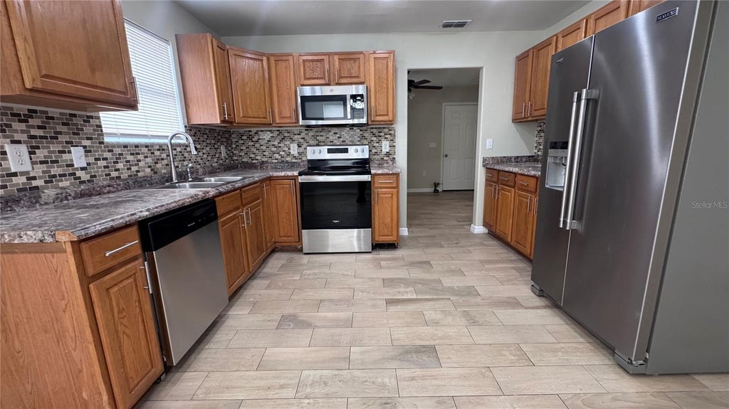 Photo of 16165 Redington Street, Brooksville, FL 34604 (MLS # W7889558)