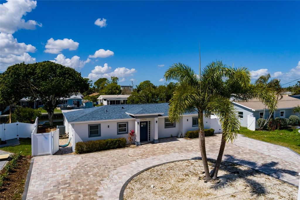 Photo of 9046 Treasure Lane NE, St Petersburg, FL 33702 (MLS # TB8480780)