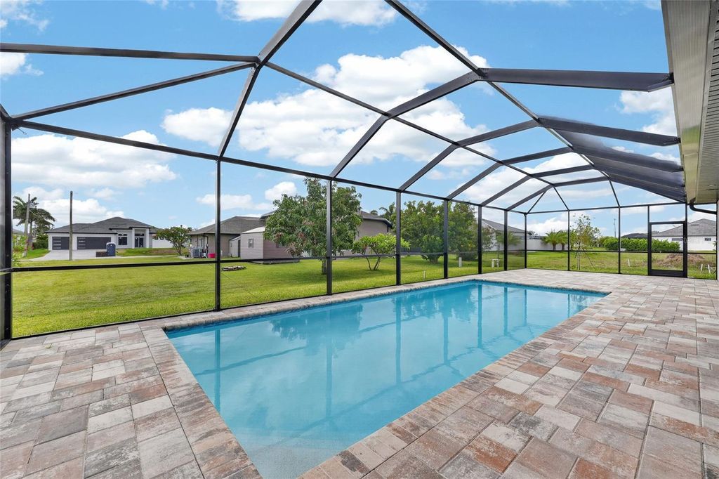 Photo of 817 NW 38th Place, Cape Coral, FL 33993 (MLS # C7526609)