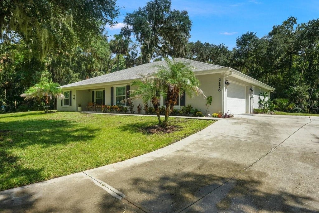 Photo of 2176 Juanita Drive, New Smyrna Beach, FL 32168 (MLS # V4951319)