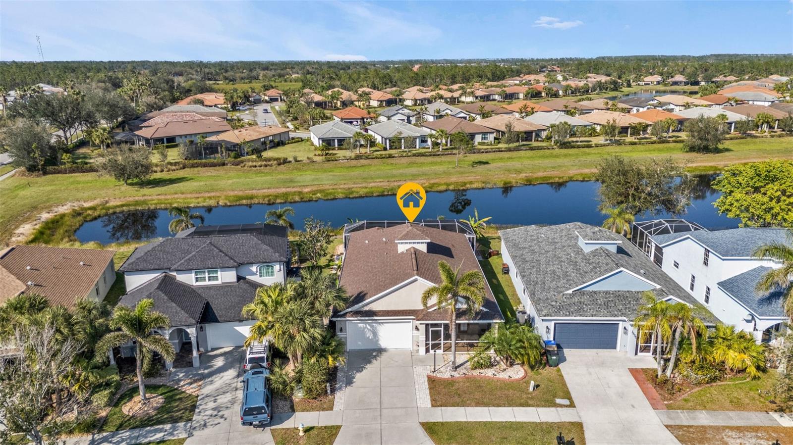 SELLER SAYS SELL! Best priced pool home in NORTH PORT OR LAKESIDE! Beautiful LARGE POOL home with an ENORMOUS GREAT ROOM that is perfect for entertaining or for those just looking for extra space! Located in the highly sought after lakeside Planttion! BraND NEW POOL CAGE AND EXTENTION ON LANAI! Gorgeous LAKE VIEW with plenty of privacy. This is a unique floor plan with a split bedroom layout. A columned archway separates the dining and living room areas. The living room features a beautiful built-in entertainment center, tray ceiling plus a 4-panel pocket slider which opens to the lanai and pool area! Spacious kitchen with large breakfast bar, 42" solid wood cabinets, newer STAINLESS STEEL APPLIANCES and DOUBLE PANTRIES for extra storage. New Driveway pavers installed in 2022, as well as new vacuum system for pool in 2022. To add the lanai was upgraded in 2023 with new pool cage, new extended concrete on the exterior of the lanai, hot tub and electrical installed in 2023, new irrigation controls and lines in 2023, pool deck newly painted in 2023 and new landscaping and upgrades! In 2024, new paver pathway to pool area installed, new range and BRAND NEW POOL PUMP! The master suite has a tray ceiling, large walk-in closet, dual sinks, garden tub, walk-in shower and pocket sliders which open up to the pool area! Soft, neutral colors throughout plus diagonal tile throughout the great room! No carpets to maintain as all bedrooms have wood laminate flooring. Upgraded AC and air handler with UV lighting. This is truly a UNIQUE home! Located in the Lakeside Plantation community. Amenities include a large, heated community pool and hot tub, tennis courts, fitness center, billiard room, basketball court, playground, card room, and a large clubhouse with WI-FI. Monthly social activities are planned for all ages! This is one of the rare homes located in the community that is NOT part of the HOA. There are no HOA fees required for this property - but you still have access to all of the amenities! All of the benefits and amenities of living in a community without the extra fees!