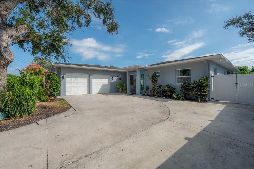 Welcome to 5619 25th St W, where modern comfort meets coastal convenience! This beautiful 3-bedroom, 2-bath home was rebuilt from the ground up in 2019, offering peace of mind and stylish finishes throughout. Step inside to find 10-foot ceilings, no carpet anywhere, and a split floor plan that gives everyone their own space. The kitchen shines with white shaker cabinets, custom lighting, new stainless steel appliances, and a convection oven, all opening seamlessly into the bright living are, perfect for entertaining. The primary suite features a walk-in closet and a beautifully designed ensuite bath, creating the perfect private retreat. Enjoy Florida living year-round with two screened-in porches, ideal for morning coffee or evening relaxation. Outside, you’ll love the fully fenced, oversized backyard, a blank canvas ready for your garden, pool, or dog run. Additional highlights include impact windows, a large driveway with plenty of room for your boat or RV, and no HOA or CDD fees! You’re just minutes from the area’s best restaurants, shops, and Gulf beaches.