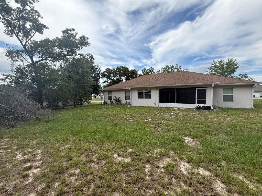 Photo of 5061 SW 109th Loop, Ocala, FL 34476 (MLS # OM707004)