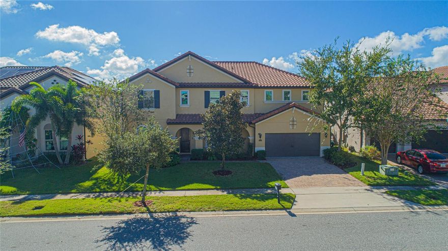 Welcome home to the highly desirable community of Parkside in Dr. Phillips. This HOME is fit for any executive! The chef’s kitchen features granite counter tops, stainless steel appliances with a double oven. The home has 5 LARGE bedrooms, 3.5 Bath and a built in office. The master bedroom is upstairs. The backyard has Commerical landscaping with an oversized pool and spa. The community features include a clubhouse, swimming, pool, tennis court and playground.  Dr. Phillips Community has upscale shopping with central Florida's famed Restaurant Row and world-class theme parks are just minutes away, while major roads, airports and downtown Orlando are easily accessible. Schedule your showing today!!!