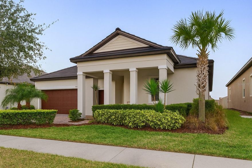 Enjoy MAINTENANCE FREE living in the 55+ GATED Medley section of the Mirada Lagoon Community, in this meticulously UPGRADED Halos model (Radiance Series) which offers 3 bedrooms, 2.5 baths, and 2,350 sq. ft. of thoughtfully designed living space—truly exceptional value for discerning buyers. Great CURB APPEAL with Concrete flat tile Roof, Tropical Landscaping, Brick PAVER driveway, walkway and COVERED front PORCH! Once inside, Elegant Foyer greets you with 17" ceramic tile on diagonal and TRAY ceiling separating guest wing (secondary bedroom and bath) from Common area. Split bedroom plan offers the expansive owner’s suite, featuring a luxurious bath with dual sink areas and separate mirrors, along with a generous walk-in closet complete with custom organizers and a stunning quartz-topped center island. The STUNNING state-of-the-art kitchen is OPEN to the Great Room and provides abundant storage, center Island breakfast bar, Butlers pantry and WALK in pantry while a versatile flex room serves perfectly as an office, den or guest retreat. Great room OPENS to screened rear lanai which overlooks the partically FENCED (3 sides..just needs gates to complete) backyard to enjoy the Florida sunsets!
A second-floor storage room helps keep your home organized and clutter-free.  This property is MOVE IN READY and loaded with over $40,000 in premium upgrades, including a seco custom-built butler’s pantry with wine cooler, Culligan whole-house water softener and carbon filtration system, custom entertainment unit with electric fireplace in Great room, upgraded GE Profile appliances (plus a 2024 refrigerator), 42” wood laundry cabinets with utility sink, and custom organizers in all three walk-in closets. Additional highlights include upgraded lighting and fans, and energy-efficient systems such as a Carrier 15 SEER AC and a 2024 hybrid 50-gallon water heater for low energy bills! Best of all, Medley’s exterior maintenance  provides true peace of mind, with services including full lawncare (mowing, mulching, trimming, blowing, fertilizing, and insect control) plus scheduled exterior painting every seven years. Added value continues with a Tier 1 pest-control system with bait stations and a yearly termite bond, along with the additional storage space in the upstairs room off the 2 car garage with GOLF CART garage parking too! This is the perfect blend of luxury, convenience, and carefree living in the Resort Style 55+ section of MEDLEY in Mirada offering exclusive amenities including Clubhouse, onsite restaurant, beach entry pool, pickleball courts, fitness center, ballroom with banquet facilities and planned classes, activities, events and excursions. Located North of Tampa, just off Major highway for easy access to Wesley Chapel, Ocala, Orlando, Lakeland, Airports and Florida Beaches!  CALL TODAY to see why this IS the place to BE!