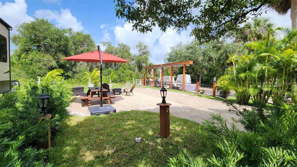 Photo of 410 Longhorn Drive, River Ranch, FL 33867 (MLS # TB8338039)