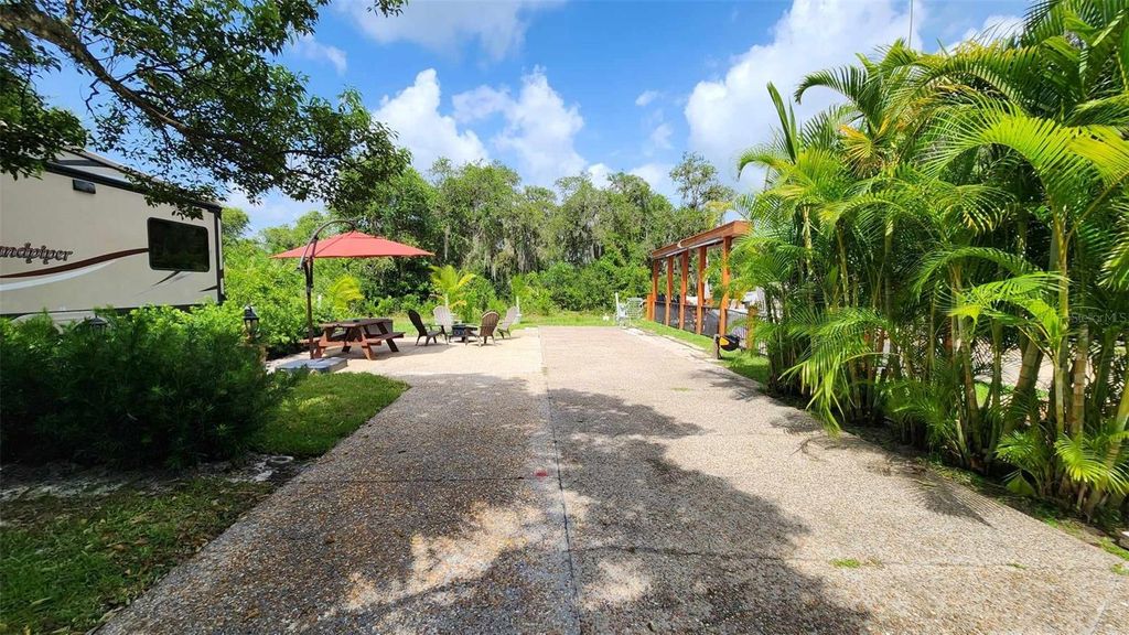 Photo of 410 Longhorn Drive, River Ranch, FL 33867 (MLS # TB8338039)
