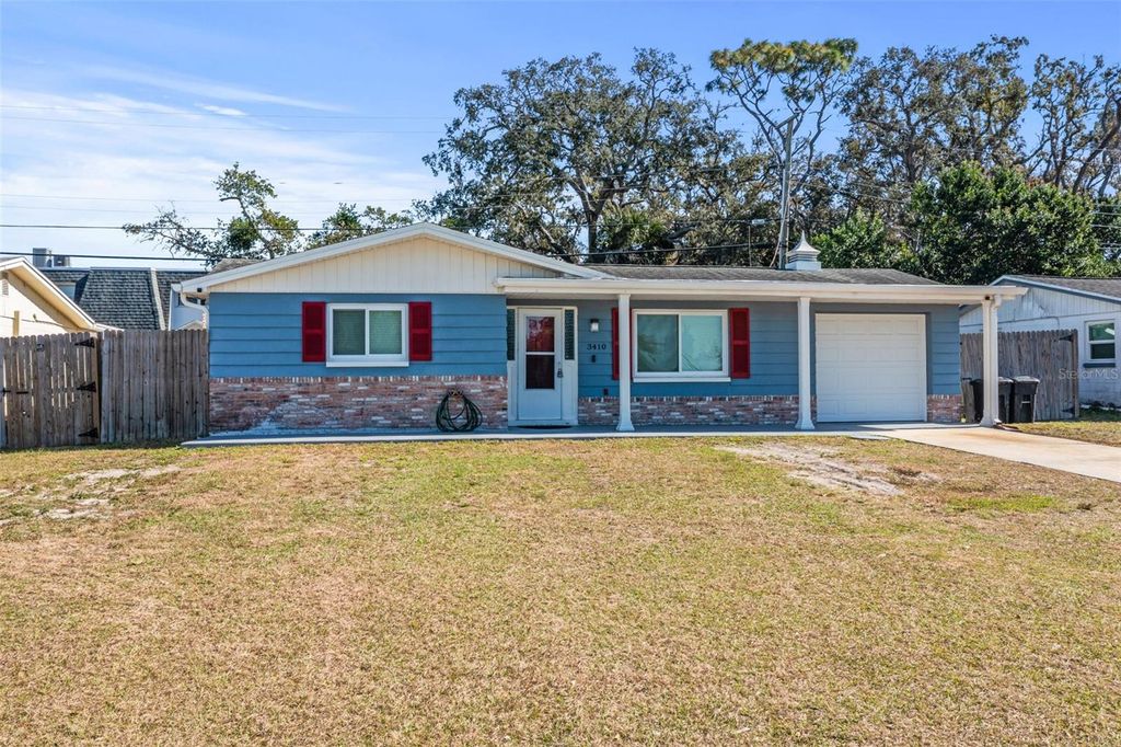 Photo of 3410 Pinehurst Drive, Holiday, FL 34691 (MLS # TB8466720)
