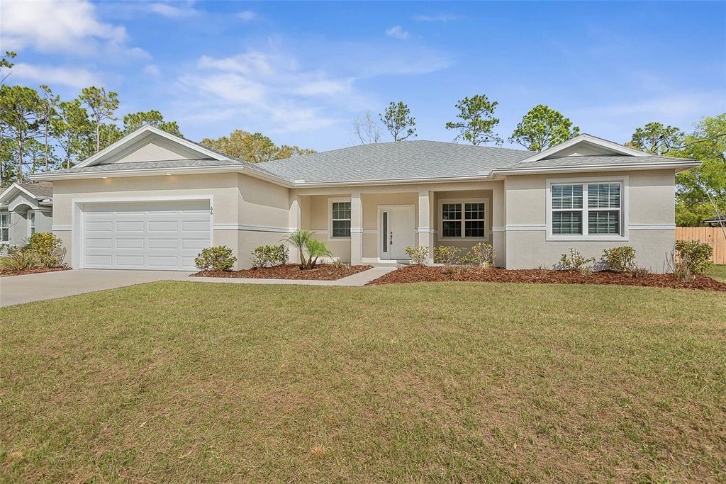 Photo of 66 Westhampton Drive, Palm Coast, FL 32164 (MLS # FC316875)