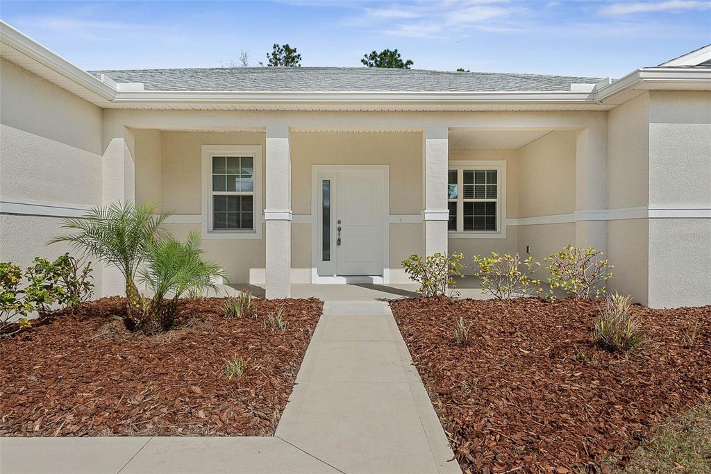 Photo of 66 Westhampton Drive, Palm Coast, FL 32164 (MLS # FC316875)