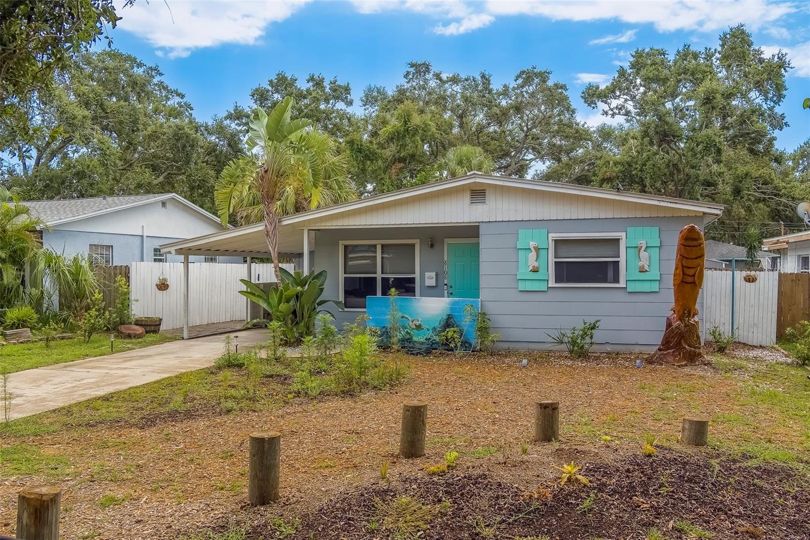 Wonderful location in highly sought after Jungle Terrace! This 3/2 home boasts an updated kitchen and two remodeled bathrooms. The large deep fenced in lot offers plenty of room for a pool if desired. The lush landscaping and mature trees create a great space for outdoor living! Walter Fuller Park and Community Center are in close walking distance and offer a community pool, tennis courts, playground, soccer and baseball fields as well as a scenic walking trail around the lake. Close proximity to the beautiful Gulf Beaches, Tyrone Mall, and restaurants. Easy access to the inter-coastal water way where you can utilize the public boat ramp or sit and catch a sunset. This is the perfect place to call home. ***Metal roof and solar panels were installed in 2021. Solar panels will be paid off by seller at closing.*** NON-FLOOD ZONE