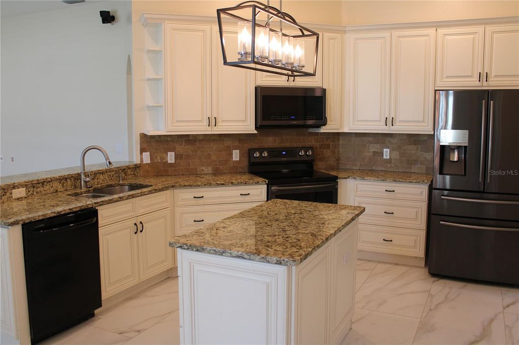 Photo of 4423 Useppa Drive, Bradenton, FL 34203 (MLS # A4684799)