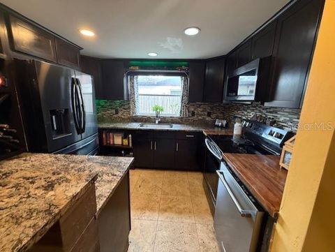 Photo of 3301 Elkridge Drive, Holiday, FL 34691 (MLS # O6414619)