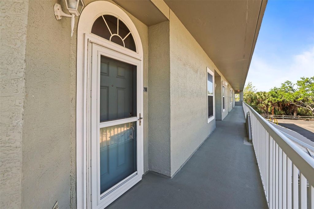 Photo of 5 Island Park Place #206, Dunedin, FL 34698 (MLS # TB8486287)