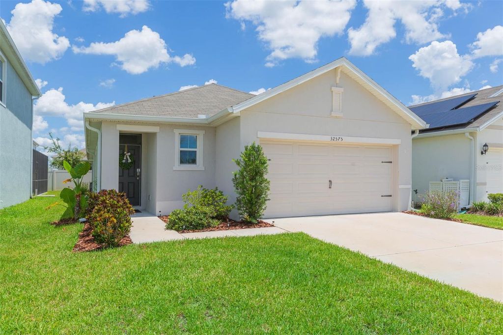 Photo of 32575 Canyonlands Drive, Wesley Chapel, FL 33543 (MLS # TB8411534)