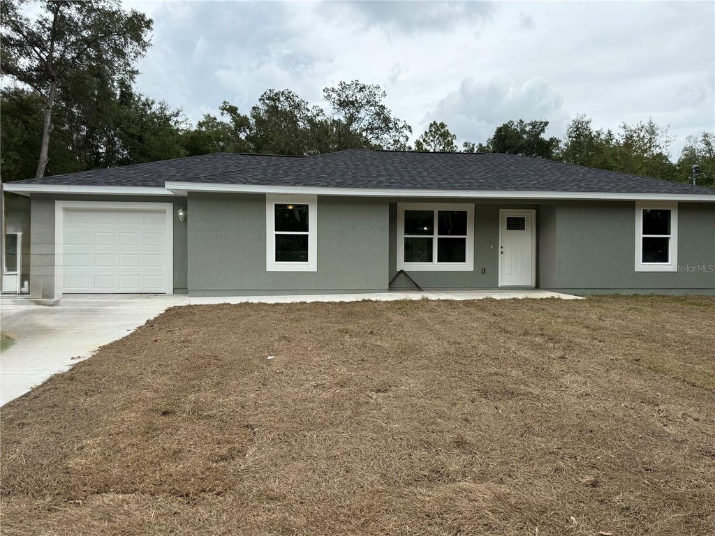 Photo of 1275 NW 52nd Court, Ocala, FL 34482 (MLS # OM733990)