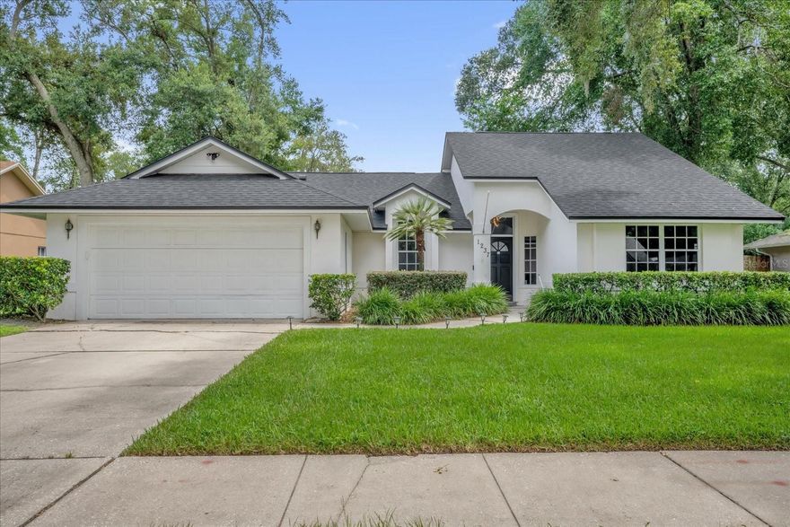 This beautifully renovated 3-bedroom, 2-bath home, offering 1,766 sqft of spacious living, sits peacefully on a lush quarter-acre lot in desirable Altamonte Springs. Meticulously updated just three years ago, this property features all-newer major components, ensuring worry-free living with a modern touch. Step inside to discover an inviting, open floor plan highlighted by contemporary finishes, stylish fixtures, and abundant natural light throughout. Enjoy seamless flow from the spacious living area into the thoughtfully designed kitchen, perfect for entertaining and everyday living. Step outside into your own personal backyard oasis, bursting with a vibrant and diverse garden featuring over a dozen varieties of fruits, including guava, cherry, raspberry, blueberry, papaya, orange, lime, tangelo, starfruit, peach, banana, grape, blackberry, and pineapple—your private farmer's market awaits! Conveniently located close to shopping, dining, parks, and great schools, this charming home blends tranquility with accessibility. Don't miss your chance to own this exceptional Altamonte Springs gem!