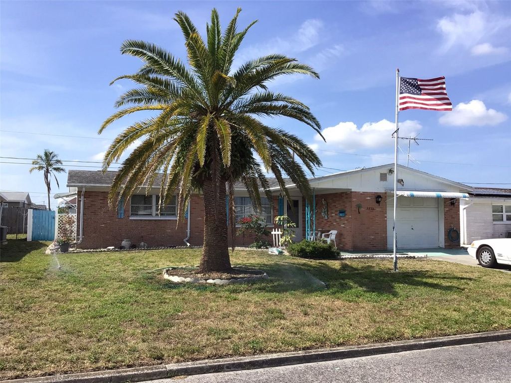 Photo of 3850 Sablewood Drive, Holiday, FL 34691 (MLS # TB8377690)