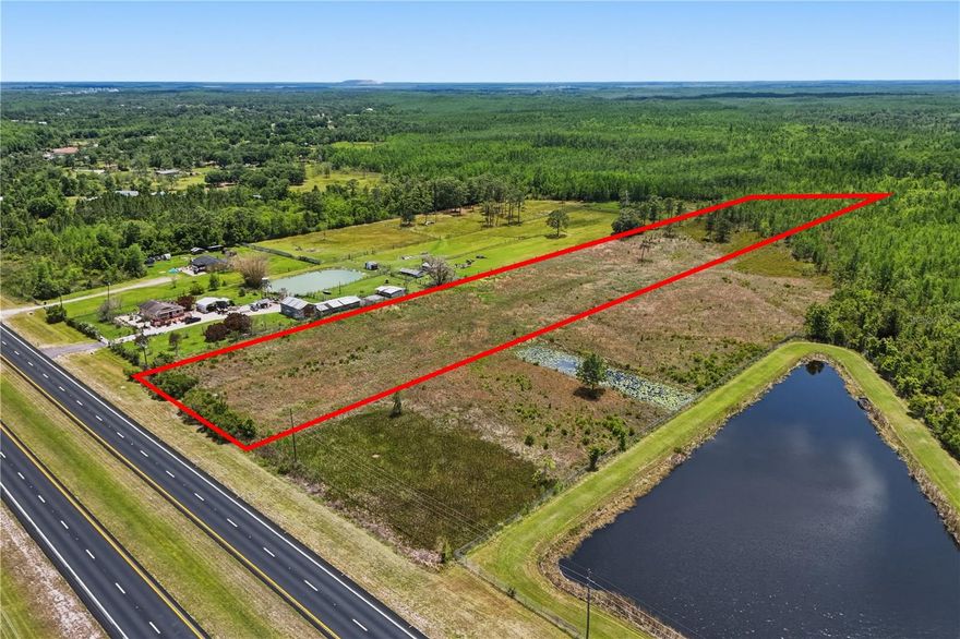 This exceptional 6.37-acre property presents a rare opportunity to own a prime piece of land with approximately 200 feet of frontage along E. Irlo Bronson Memorial Highway, offering incredible visibility, accessibility, and long-term investment potential in one of Central Florida’s fastest-growing corridors. With the option to negotiate the purchase of the neighboring parcel, buyers have the unique chance to expand the combined acreage to an impressive 13.17 acres — opening the door to even greater development possibilities.

Positioned in a rapidly expanding area just minutes from Harmony High and Middle Schools and only 25 minutes from Narcoossee Road and Eagle Creek near Lake Nona, this property offers the perfect balance of peaceful rural surroundings and convenient access to thriving residential and commercial growth. Acreage of this size and location is becoming increasingly difficult to find, especially at this value point.

The property is already cleared, semi-fenced, and if combined over 7 acres of high and dry usable land. Extensive due diligence has already been completed, including a survey, environmental report, and wetland mapping, saving future owners valuable time and expense. Engineering work and preliminary civil drawings are also complete, with plans allowing for approximately 43 RV pads across the combined parcels, creating an outstanding opportunity for a turnkey RV resort and campground development in an area experiencing tremendous demand and expansion. All completed reports and due diligence materials will be shared upon request.

Beyond its development potential, this land also offers an incredible opportunity to create a private estate or luxury country retreat. Imagine building a beautiful custom home surrounded by expansive open land, mature natural surroundings, and endless possibilities for outdoor living, recreation, and privacy. Whether envisioned as a personal oasis, investment hold, income-producing development, or a combination of all three, this property provides unmatched flexibility and future upside.

With major growth continuing to push outward from Lake Nona and surrounding communities, this is a chance to secure a strategic piece of land in the path of progress while still enjoying the tranquility and space that large acreage properties provide. Opportunities like this are increasingly rare — especially with engineering and preliminary planning already in place to accelerate your vision.