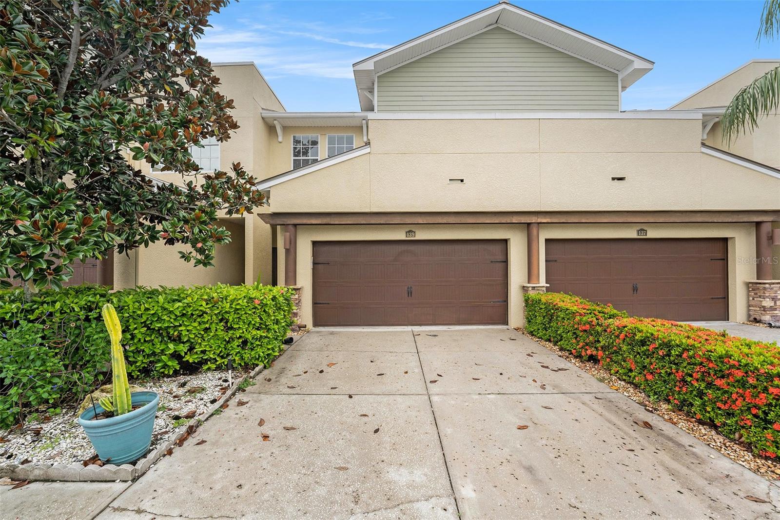 Welcome to the heart of Tarpon Springs, just steps from the legendary Sponge Docks,
Pinellas Trail, and the charm of historic downtown. This beautifully designed two-story
townhome offers 3 bedrooms, 2.5 baths, and a 2-car garage, blending modern comfort with
timeless style.
Inside, you’ll find a host of custom features, including granite countertops, rich cabinetry, a
breakfast bar, a striking staircase, and elegant fixtures—all complemented by stainless steel
appliances. The primary suite is a true retreat with a walk-in closet, spa-like bath featuring a
garden tub and separate shower, plus a private sitting area and balcony overlooking the
community pool.
The open, flowing floor plan is ideal for both daily living and entertaining, while outdoor living
shines with a partially screened lanai and an open sundeck offering tranquil lake and fountain
views.
Nestled in a vibrant yet peaceful community, this residence is perfect as a full-time home or
vacation retreat—just minutes from the beach, schools, and shopping. Come experience the
beauty and lifestyle of Tarpon Springs—your new home awaits.