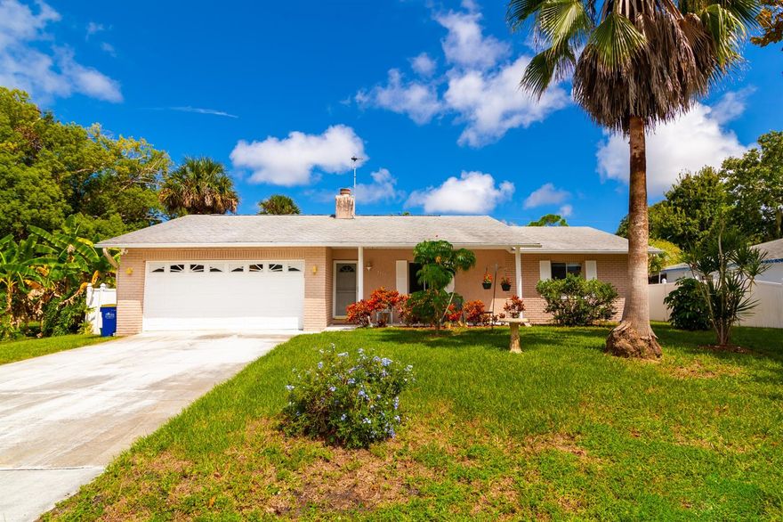 Welcome home to this well-maintained 3/2 family pool home in the Florida Shores community. Home is high and dry and there was no flooding from hurricane Ian. The home itself features a split bedroom floor plan with a large master bedroom, walk in closet and remodeled bathroom. A lovely stone fire place highlights the living room and dining room area with French doors leading out to the pool area. Stainless steel appliances in kitchen. Enjoy the gorgeous screened in pool area, perfect for entertaining friends and family. The yard is fully fenced and sits on a 80x125 size lot that includes a utility shed with electric.  Sizeable 2 car garage with washer and dryer. The home also features a water filtration system throughout the entire home. Centrally located near shopping, schools, I-95, parks and beaches. No HOA. 
All information to be verified by Buyer, measurements are approximate. ;Water: City