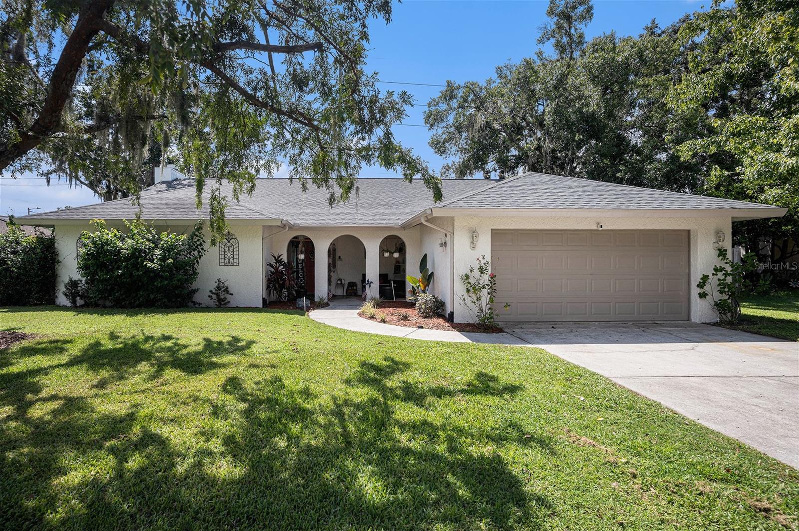 Step into this 3-bedroom, 2-bathroom pool home with a well-designed, open layout. The living area is centered
around a cozy fireplace, perfect for gathering with family and friends, and flows effortlessly into a bright
sunroom/Florida room — the ideal spot to enjoy a morning coffee or unwind with a book. A formal dining room
offers a great setting for hosting dinners and special occasions, while the split-bedroom floor plan ensures
privacy and comfort for all. Outside, the screened-in pool and patio make this home perfect for both relaxing
and entertaining year-round. The home is located in a peaceful neighborhood with low HOA fees and access
to plenty of amenities, including a clubhouse, community pool, park, tennis courts, and more. With its solid
structure and thoughtful design, this home provides a wonderful opportunity to add your personal style. Don’t
miss your chance — schedule your showing today!