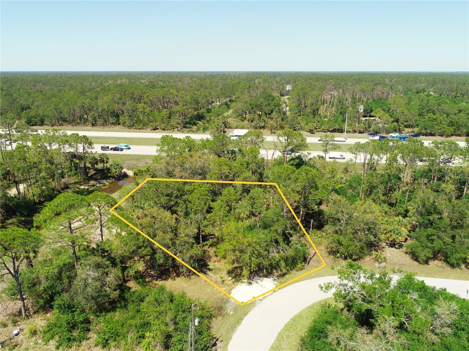 Owner financing available! Discover the perfect spot to build your dream home on this spacious 0.3-acre lot in North Port! Located on Chorley Ave, this property offers a peaceful, residential setting while still being close to shopping, dining, and outdoor recreation. With a clean environmental report on file, no HOA restrictions, and rapid growth in the area, this is a fantastic opportunity for homeowners and investors alike. Agent has ownership interest in the property. Buyer should verify all details.