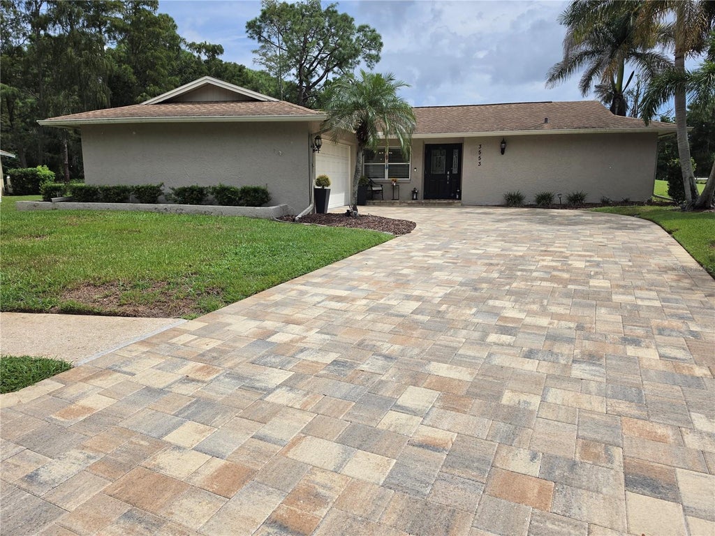 Photo of 3553 Fairway Forest Drive, Palm Harbor, FL 34685 (MLS # TB8544293)