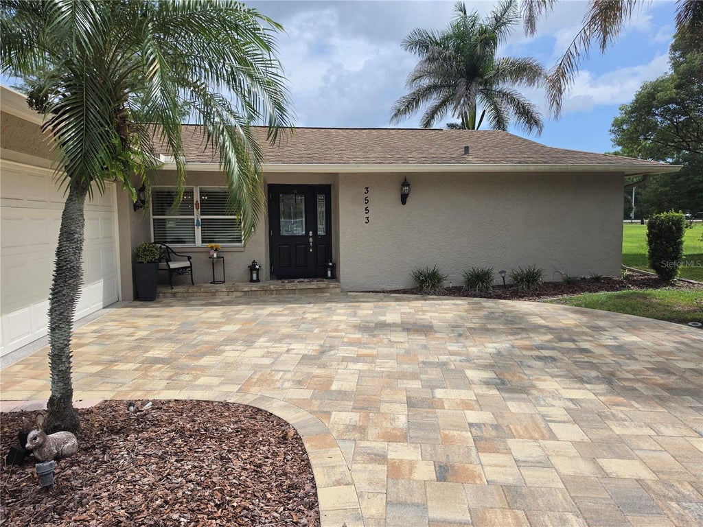 Photo of 3553 Fairway Forest Drive, Palm Harbor, FL 34685 (MLS # TB8544293)