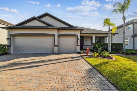 Photo of 12352 Crestridge Loop, New Port Richey, FL 34655 (MLS # W7880938)