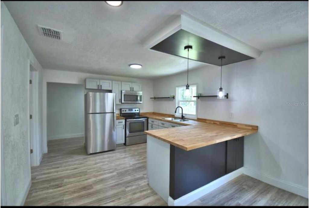 Photo of 1104 E 8th Street, Sanford, FL 32771 (MLS # O6389649)