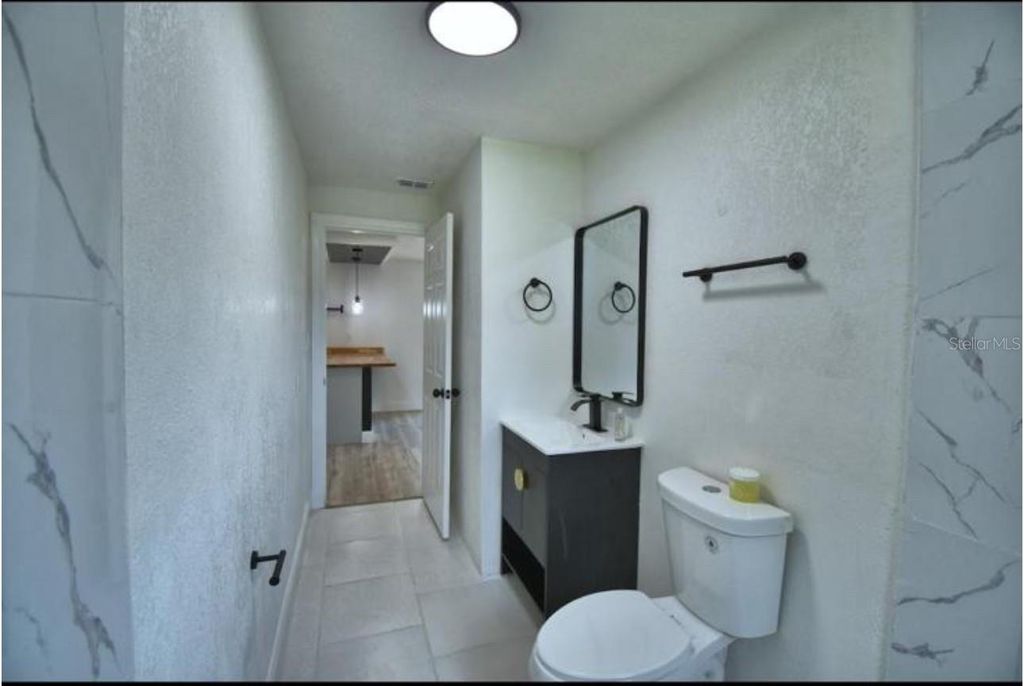 Photo of 1104 E 8th Street, Sanford, FL 32771 (MLS # O6389649)