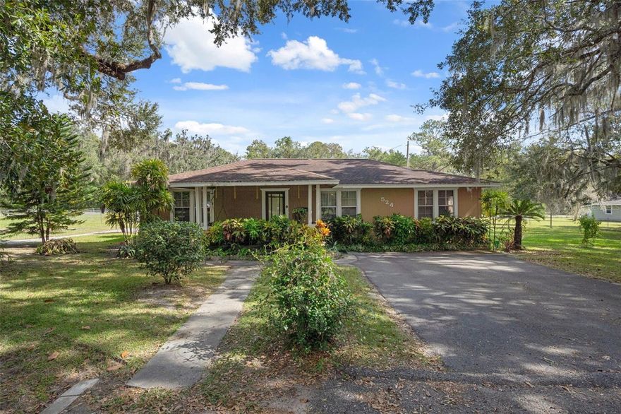 Opportunity knocks in Brooksville! Looking for your next flip? Set on a spacious .7-acre 5 lot acreage with no deed restrictions, this 3-bedroom, 2-bath home is ready for your vision and creativity. Such a beautiful setting with 5 total lots. 2 lot sizes are .14/6100sf, house is on .42 acre/18,300 sf. Whether you’re an investor, flipper, or homeowner looking for a project with big potential, this property offers endless possibilities—remodel the existing home, expand, or even build one or two additional homes, a workshop, or garage. Updates include a 2014 roof and 2017 electrical upgrade.  Hard wood floors exist under the living room carpets-it was painted brown.  May be salvagable. Just outside Brooksville’s charming historic district—enjoy weekend farmers markets, parades, local dining, and small-town charm—all with easy access to I-75 and the Suncoast Parkway (589) and only about 50 minutes to Tampa International Airport. Bring your tools and imagination—this is the perfect canvas to create your dream or next investment! No repairs will be made. Property is sold as is. This is a fixer upper with 3 additional lots.  Build a new one or a large garage or home for family member. No wholesale offers, please.