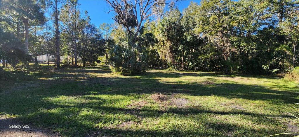 Photo of 680 E Black Point Road, Bunnell, FL 32110 (MLS # FC315581)