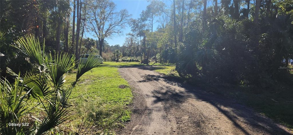 Photo of 680 E Black Point Road, Bunnell, FL 32110 (MLS # FC315581)