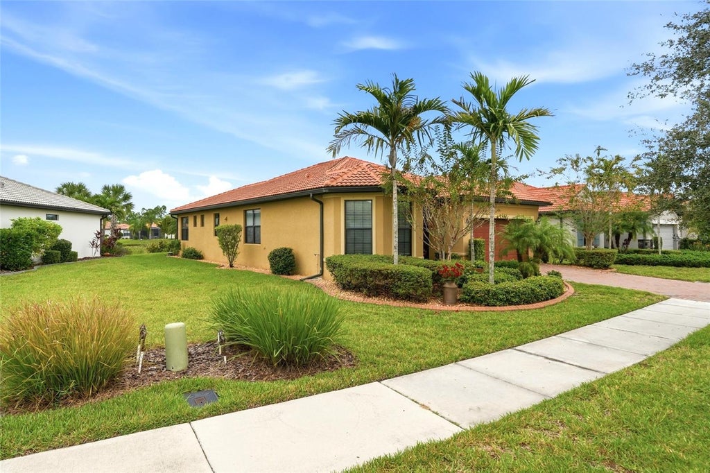 Photo of 1512 Hyssop Loop, North Port, FL 34289 (MLS # C7531845)
