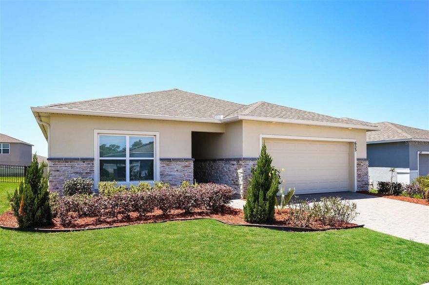 Welcome to this like new, 3-bedroom, 2-bath home featuring an open layout and updated finishes. The kitchen includes granite countertops, a large island, and stainless steel appliances, opening to a bright living area. The primary suite offers dual vanities, a walk-in shower, and plenty of storage. Secondary bedrooms are nicely sized, along with a separate laundry room for added convenience. Enjoy the covered lanai and two-car garage. Neutral interior and move-in ready. Easy to show!