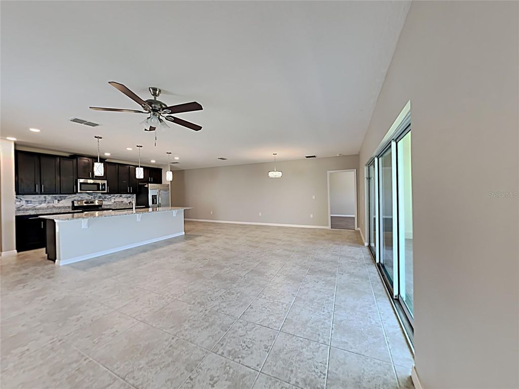 Photo of 653 Campo Lane, Davenport, FL 33837 (MLS # C7524035)