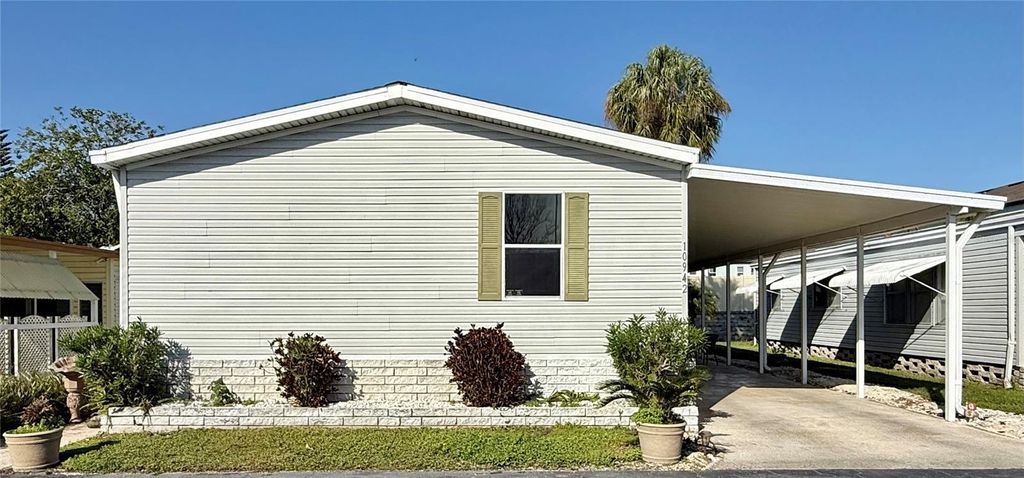Photo of 10942 Poplar Street NE #111, St Petersburg, FL 33716 (MLS # TB8485694)