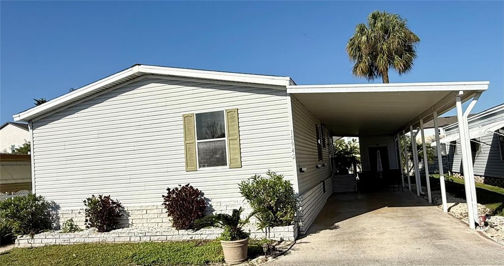 Photo of 10942 Poplar Street NE #111, St Petersburg, FL 33716 (MLS # TB8485694)