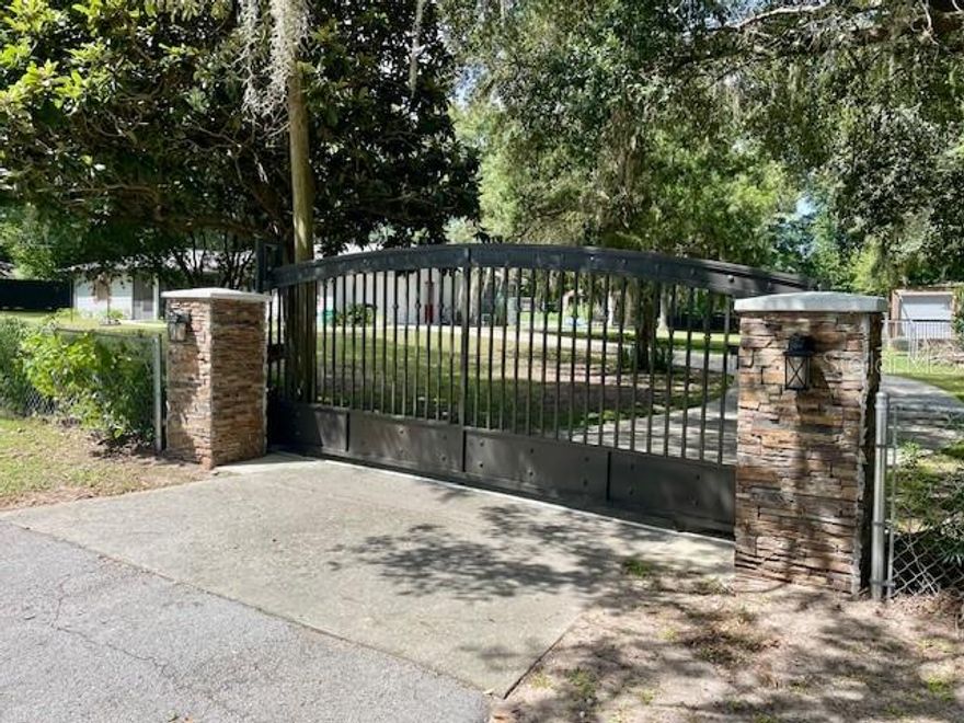 Beautifully remodeled home with a pool on a landscaped and gated acre. The two-car garage can be used as a garage or a playroom under A/C. Enjoy this private, peaceful setting close to Dunnellon's 3 Rainbow River State Parks, Riverfront Restaurants, walking & biking trails, Historic Village shops, canoeing, boating, and snorkeling. Ocala, Tampa, and Orlando are reasonably close. This home can be leased long term for $2500/mo furnished or unfurnished. It can also be leased short term fully furnished and equipped for $3000/mo. Short-term status rent includes pool maintenance, lawn care, water, cable and electricity with a limit. This is definitely a must see!