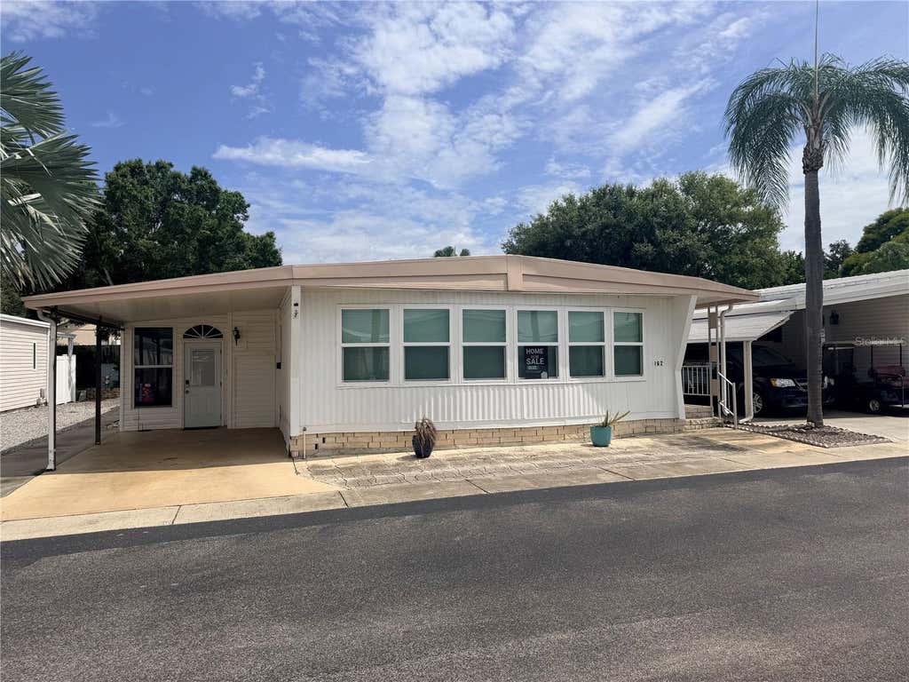 Photo of 3301 Alt 19 #162, Dunedin, FL 34698 (MLS # TB8535734)